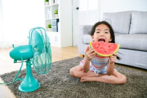 kid eating watermelon