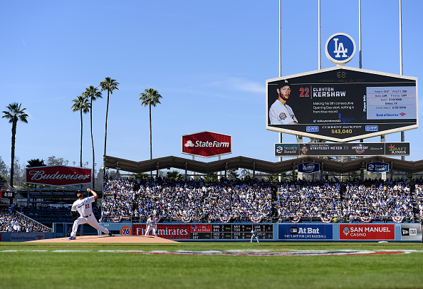 Dodgers Fan Catches Foul Ball While Holding His Baby and a Beer